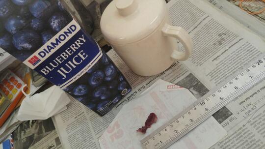 Benda asing didalam kemasan minuman Diamond Blueberry Juice