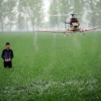 petani-cina-semprot-pestisida-pakai-drone-gan