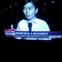 wartawan-metro-tv-meliput-aksi-4-nopember-tidak-memakai-seragam