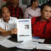 tim-rano-embay-ketua-kpu-kota-tangerang-pegang-roti-berlogo-cagub-nomor-1