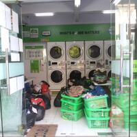 laundry-coin-business-concept--kerja-sama