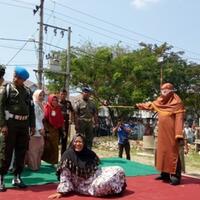 wanita-bandar-judi-togel-ini-dicambuk-26-kali