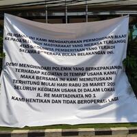 alexis-minta-maaf-lewat-spanduk