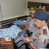 sambut-kapolri-istri-polisi-korban-teroris-di-riau-ternyata-bercadar