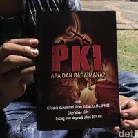 bagikan-buku-pki-gambar-jokowi-fpi-bisa-dijerat-hukum-dan-dibubarkan