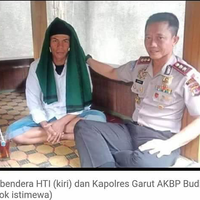 ini-sosok-pengibar-bendera-hti-saat-hari-santri-di-garut