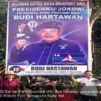 caleg-partai-pak-sby-pajang-baliho-bergambar-presiden-jokowi