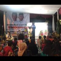 rayakan-hasil-quick-count-relawan-jokowi-gelar-wayang-wolak-walik