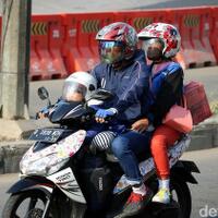aman-berkendara-tanpa-korbankan-hijab