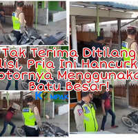 tak-terima-ditilang-polisi-pria-ini-hancurkan-motornya-menggunakan-batu-besar-lah