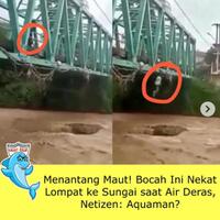 musim-hujan-datang-bocah-ini-asik-nyemplung-di-air-yang-deras-aquaman