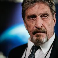 mcafee-didakwa-atas-penipuan-crytocurrency