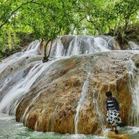 nikmati-keasrian-wisata-air-terjun-batu-raja-manitan