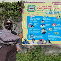 aipda-untung-nainggolan-peduli-jaga-warga-dari-penyebaran-covid-19
