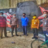 usai-vandalisme-tuhan-aku-lapar-muncul-mural-mirip-wajah-jokowi-di-tangerang