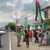 viral-potret-warga-turunkan-bendera-palestina-yang-berkibar-di-pinggir-jalan