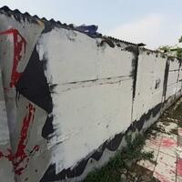 grafiti-quotkoruptor-dirangkul-rakyat-kecil-dipukulquot-dihapus-warga