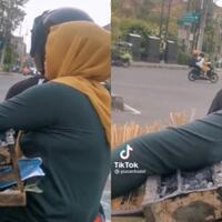ibu-penjual-sate-ini-tahan-panas