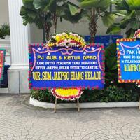 muncul-karangan-bunga--tolong-selamatkan-jakpro--di-balai-kota-dki