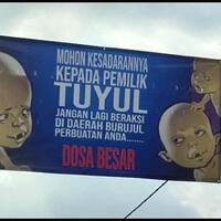 sering-kehilangan-uang-warga-tasik-pasang-spanduk-tuyul-dilarang-beraksi