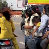 nggak-habis-pikir-emak-emak-pakai-sepeda-motor-boncengan-7-di-jembatan-ampera