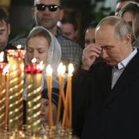 presiden-putin-khusyuk-jalani-ibadah-natal-ortodoks