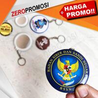 souvenir-gantungan-kunci-bulat-cermin-pvc-cetak-logo