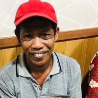 anggota-grib-yang-bakar-mobil-polisi-tersenyum-lebar-saat-serahkan-diri