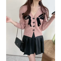 florina-ribbon-knitted-cardigan---cardigan-rajut-pita-wanita-kekinian