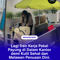 lagi-tren-kerja-pakai-payung-di-dalam-kantor-demi-kulit-sehat