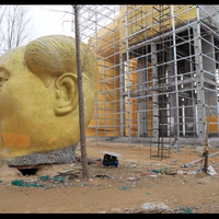 belum-sempat-diresmikan-patung-emas-raksasa-mao-zedong-dirobohkan