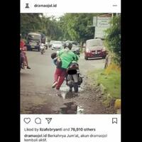 viral-inilah-tiga-driver-ojek-online-yang-menggendong-anak-saat-mengojek