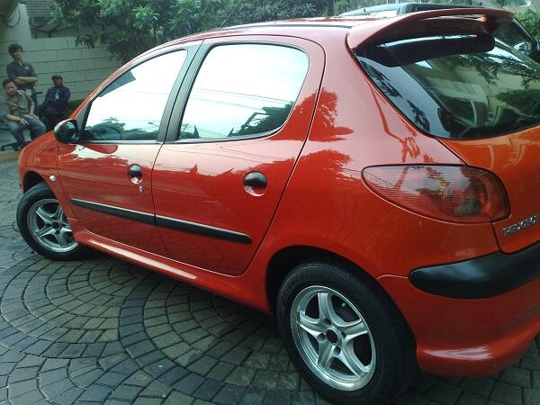 PEUGEOT 206 TH.2004 RED FERARI M/T CANTIK MEMPESONA