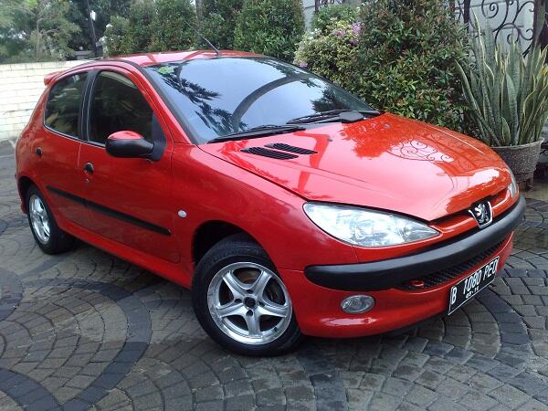PEUGEOT 206 TH.2004 RED FERARI M/T CANTIK MEMPESONA