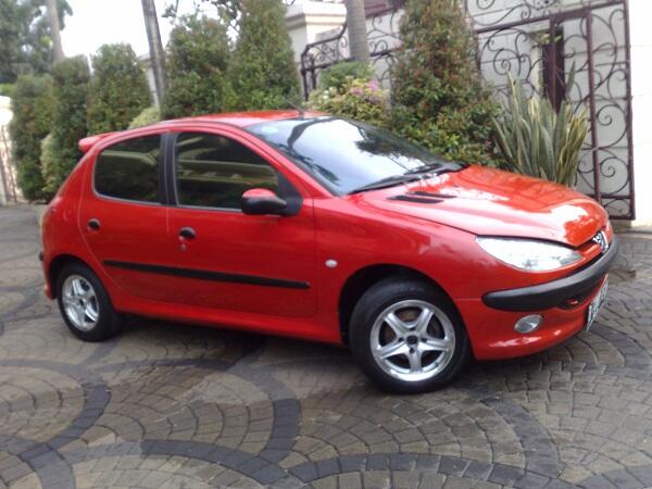 PEUGEOT 206 TH.2004 RED FERARI M/T CANTIK MEMPESONA