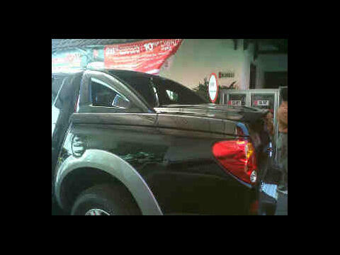 tutup bak Mitsubishi Triton