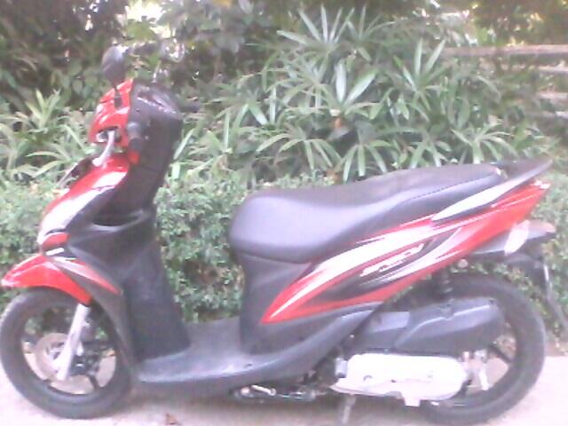 over kredit spacy merah des 2011