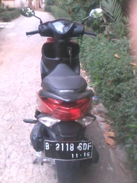 over kredit spacy merah des 2011
