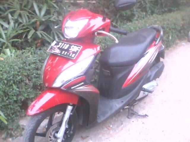 over kredit spacy merah des 2011