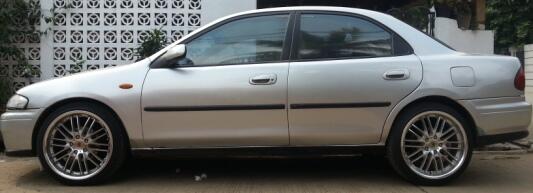 mazda 323 familia 1.8 2000 jatibening bekasi