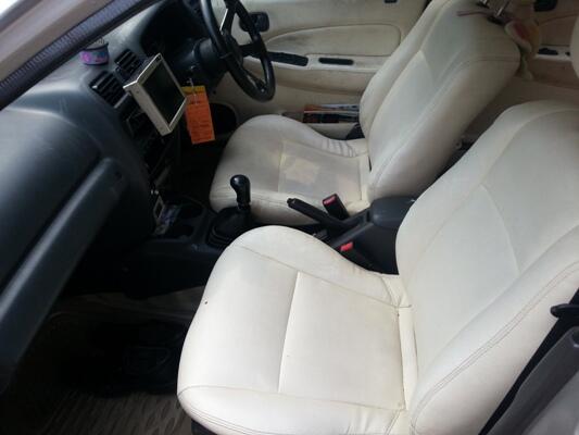 mazda 323 familia 1.8 2000 jatibening bekasi