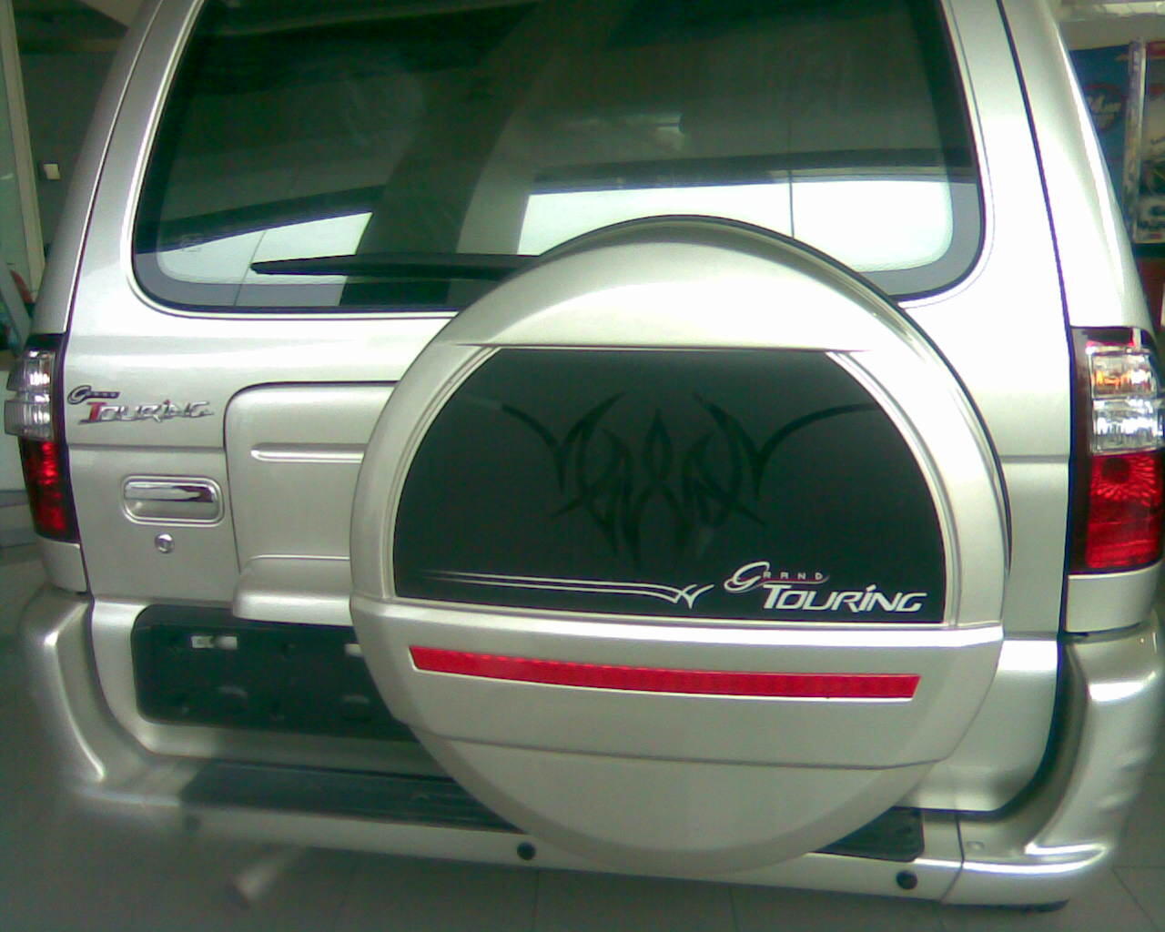 Before the 2014 redesign, all Panther Grand Touring models feature a  rear-mounted spare wheel. It was a design of its own when it comes to  distinguish the ...