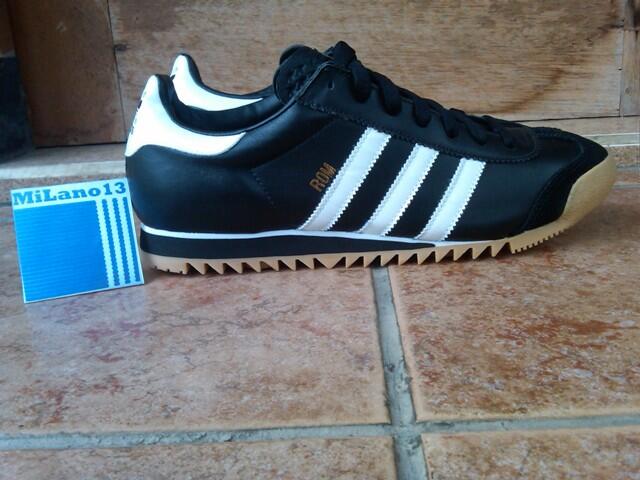 Terjual sepatu adidas ROM  ORIGINALS Black stripe White 