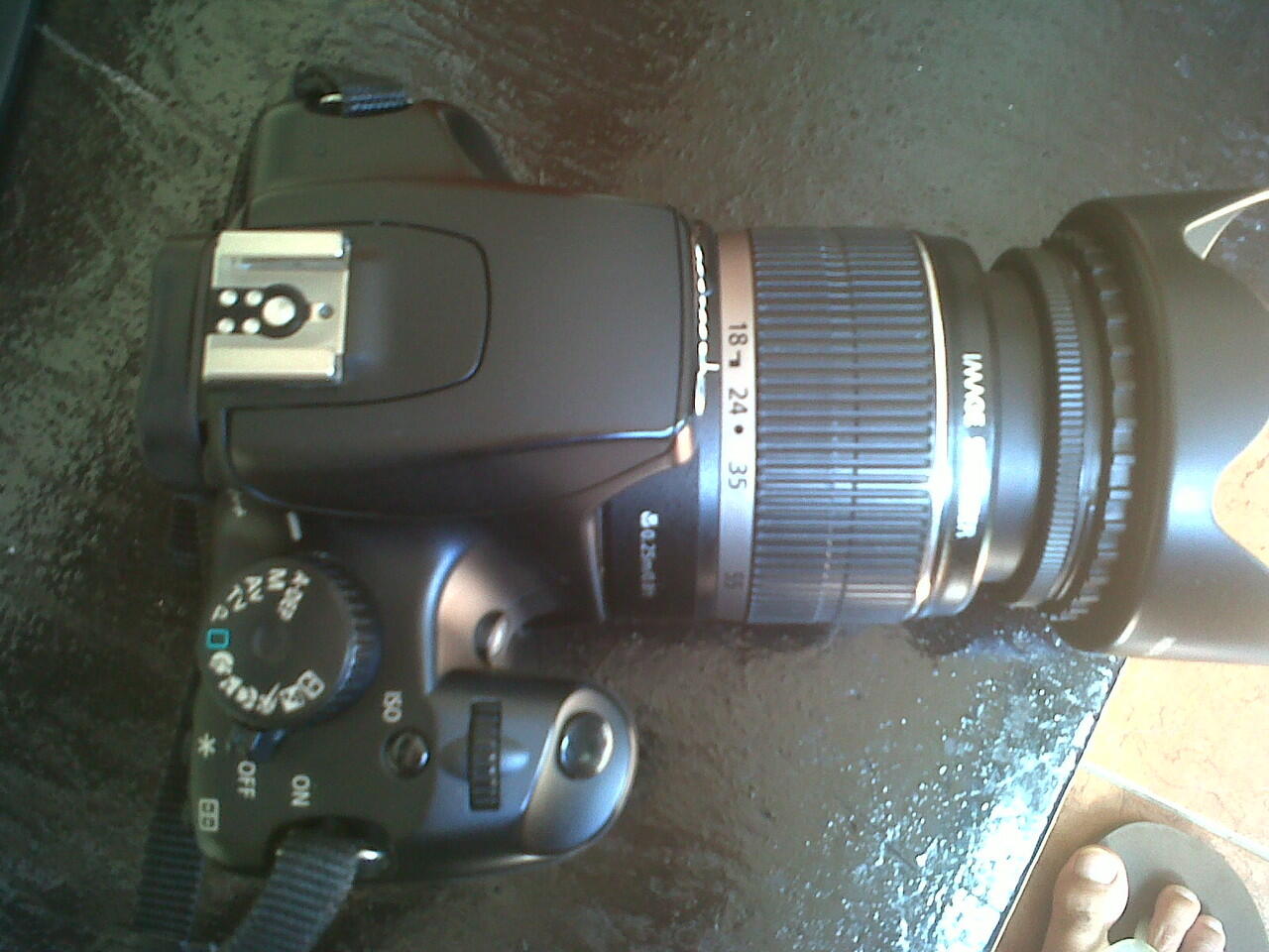 Canon 1000d EF-S 18-55 kit + hood + bag