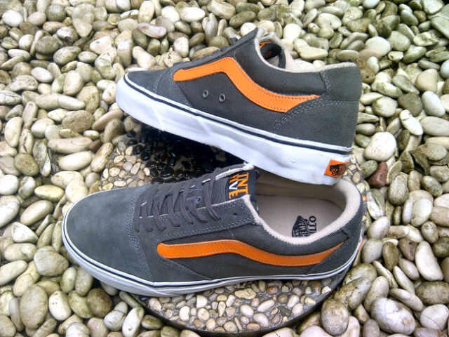 grey and orange vans