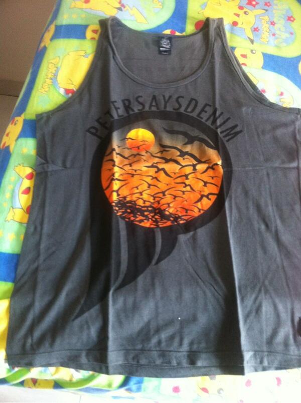 band merch kaos band the strokes 