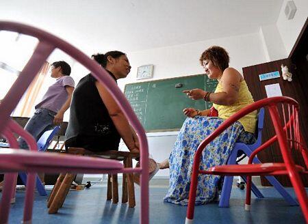 Xu Yuehua, Tanpa Kaki Merawat 130 Anak Yatim Piatu