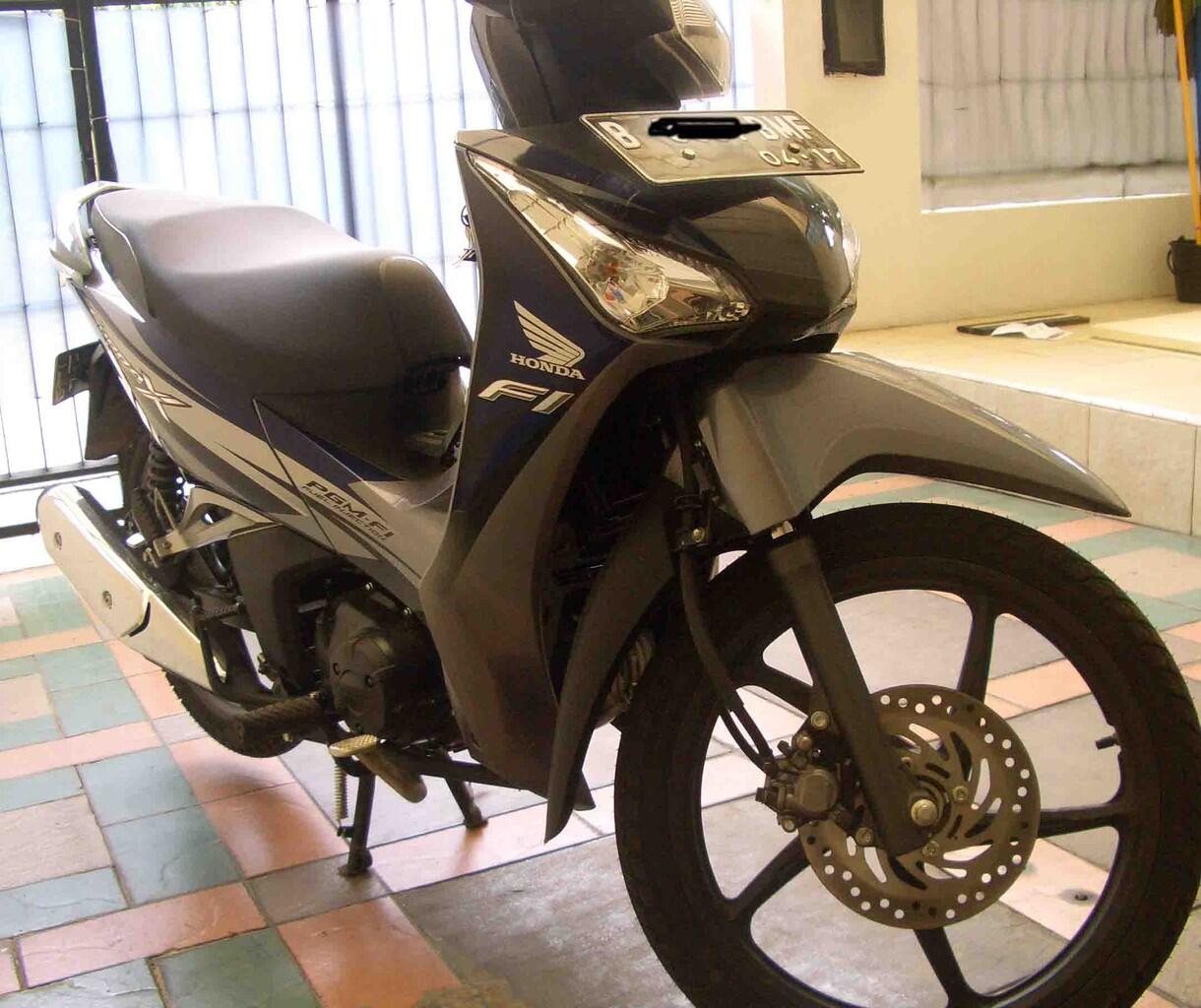 jual over kredit supra 125 helm in biru PGMFI 04/2012