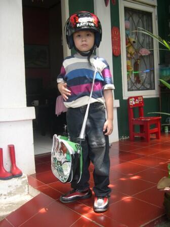 PENTINGNYA MENGGUNAKAN HELM