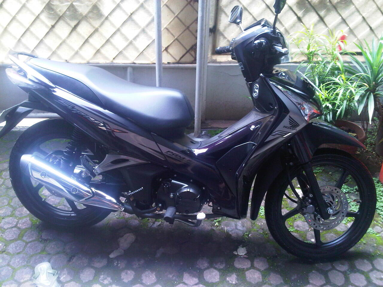 Supra X 125 helm in pgm fi 2012 mulus